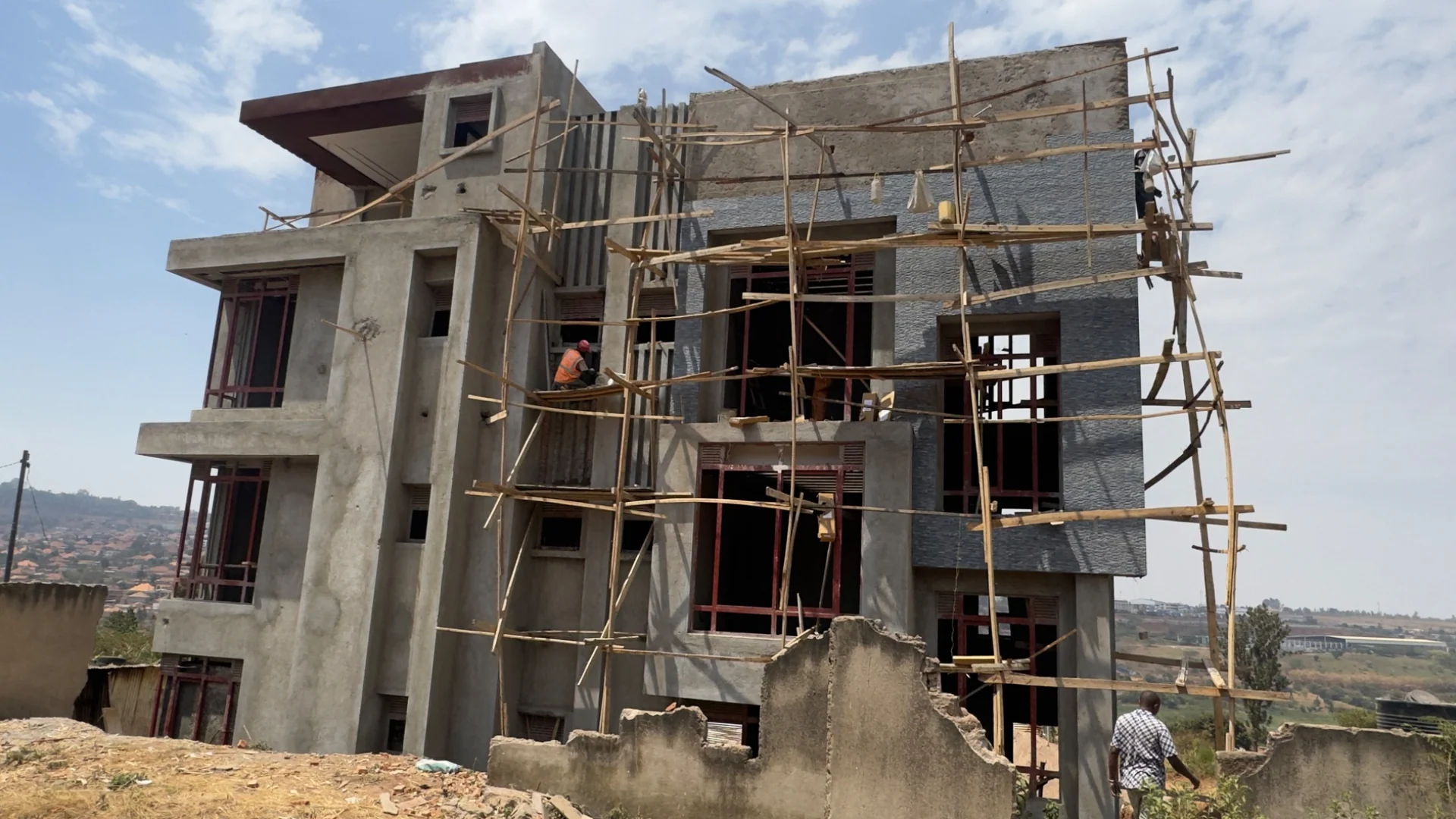 Exterior finishing in progress — original site photograph